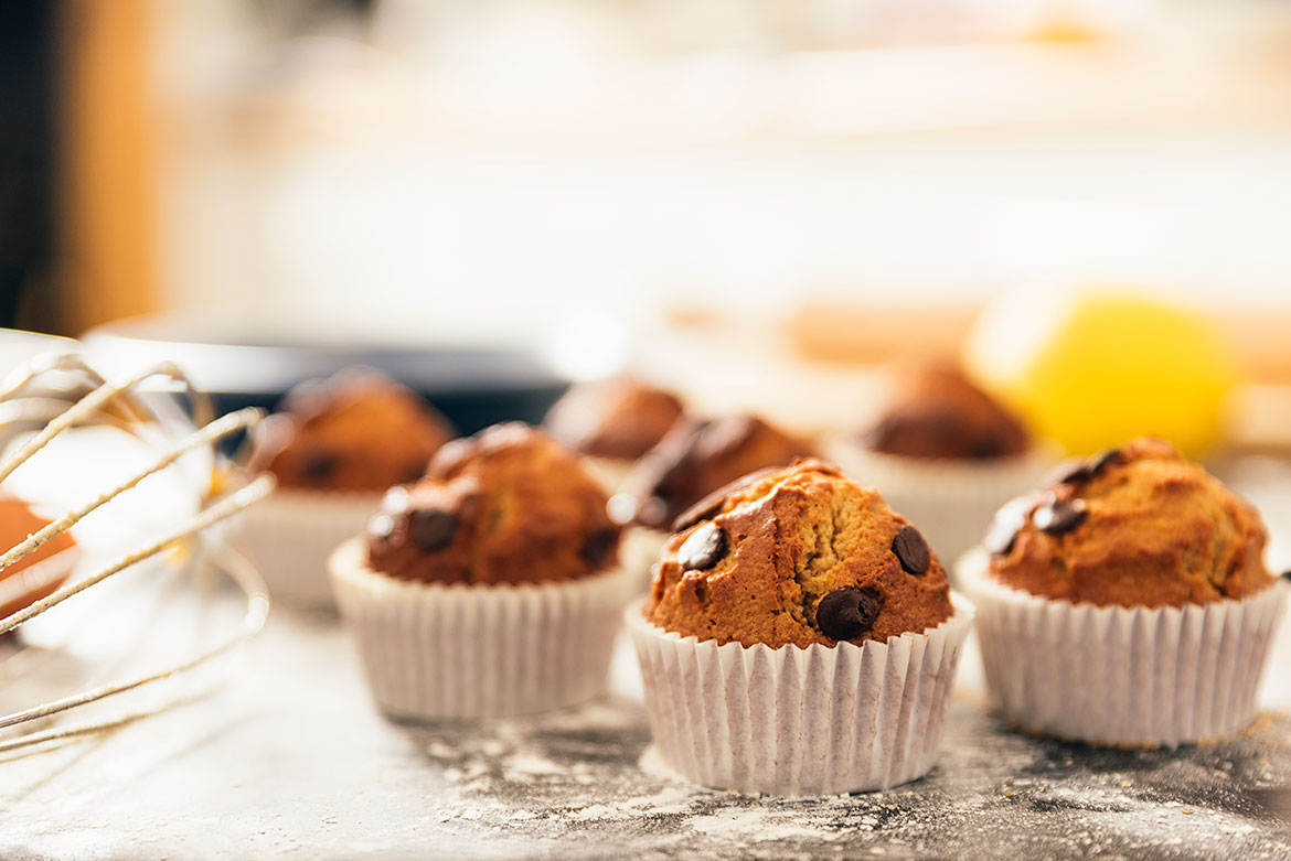 beautiful-woman-preparing-cookies-and-muffins-Q22QSQ4